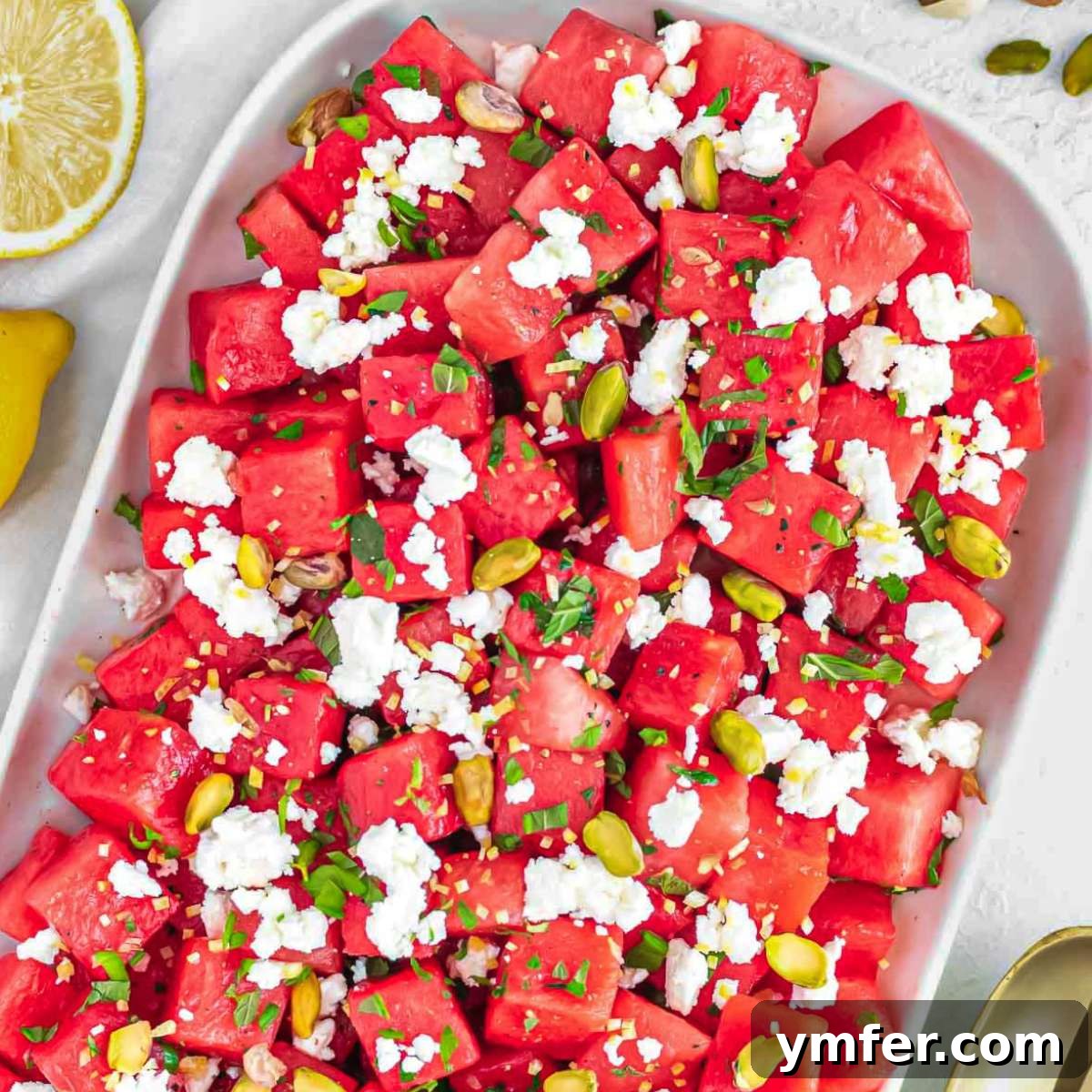 21 Fresh & Flavorful Summer Salads 14 Watermelon feta salad recipe with fresh mint leaves.