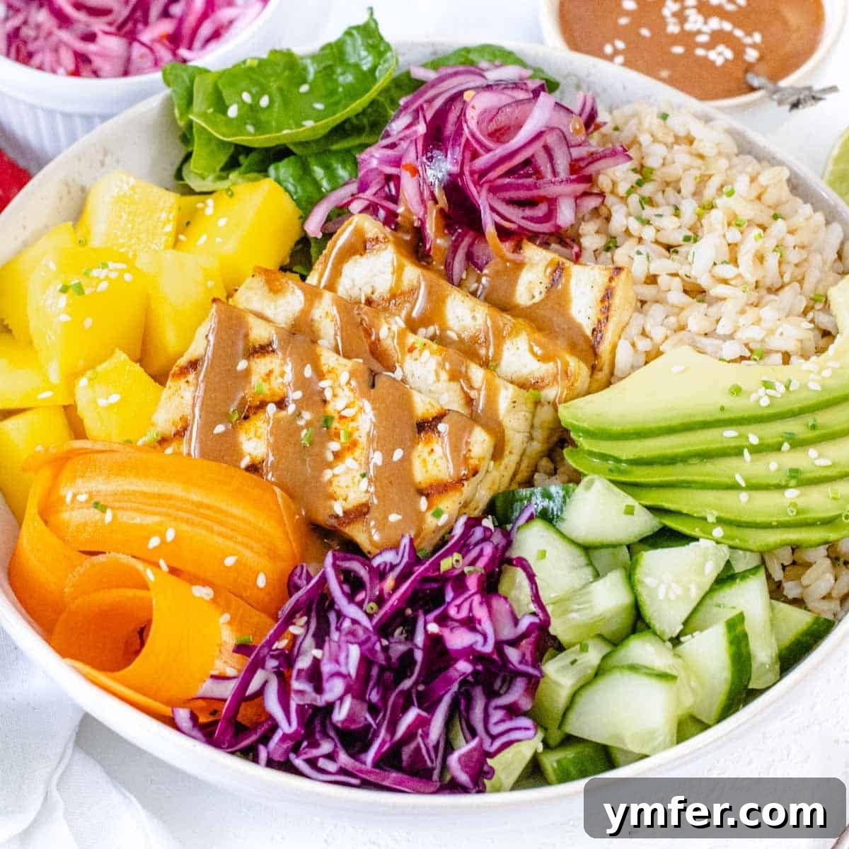 Beat the Heat 30 No-Bake Dinners 13 Nutrient-rich Buddha protein bowl with peanut sauce and fresh vegetables, a perfect make-ahead cold dinner.