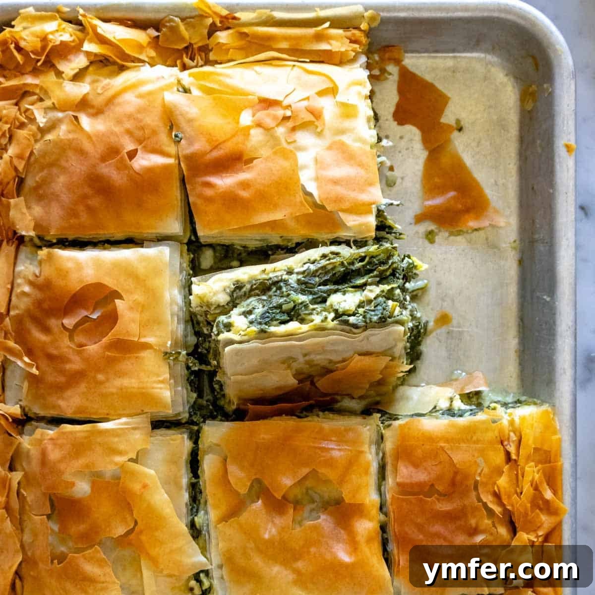 30 Delectable Picnic Recipes 18 Delicious spanakopita with a rich filling of feta cheese and spinach.