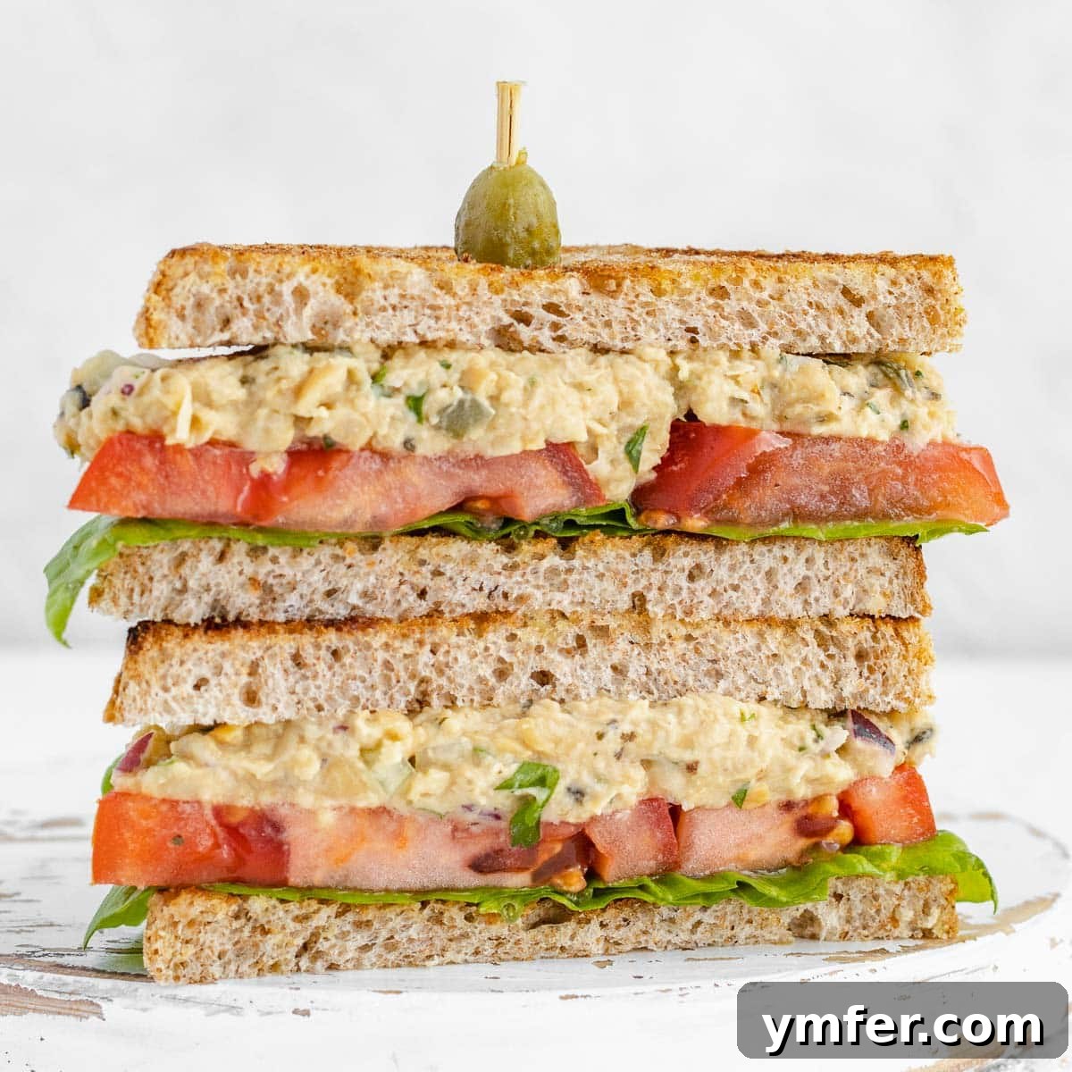 30 Delectable Picnic Recipes 3 Delicious vegan tuna sandwich made with chickpea salad, perfect for a picnic.