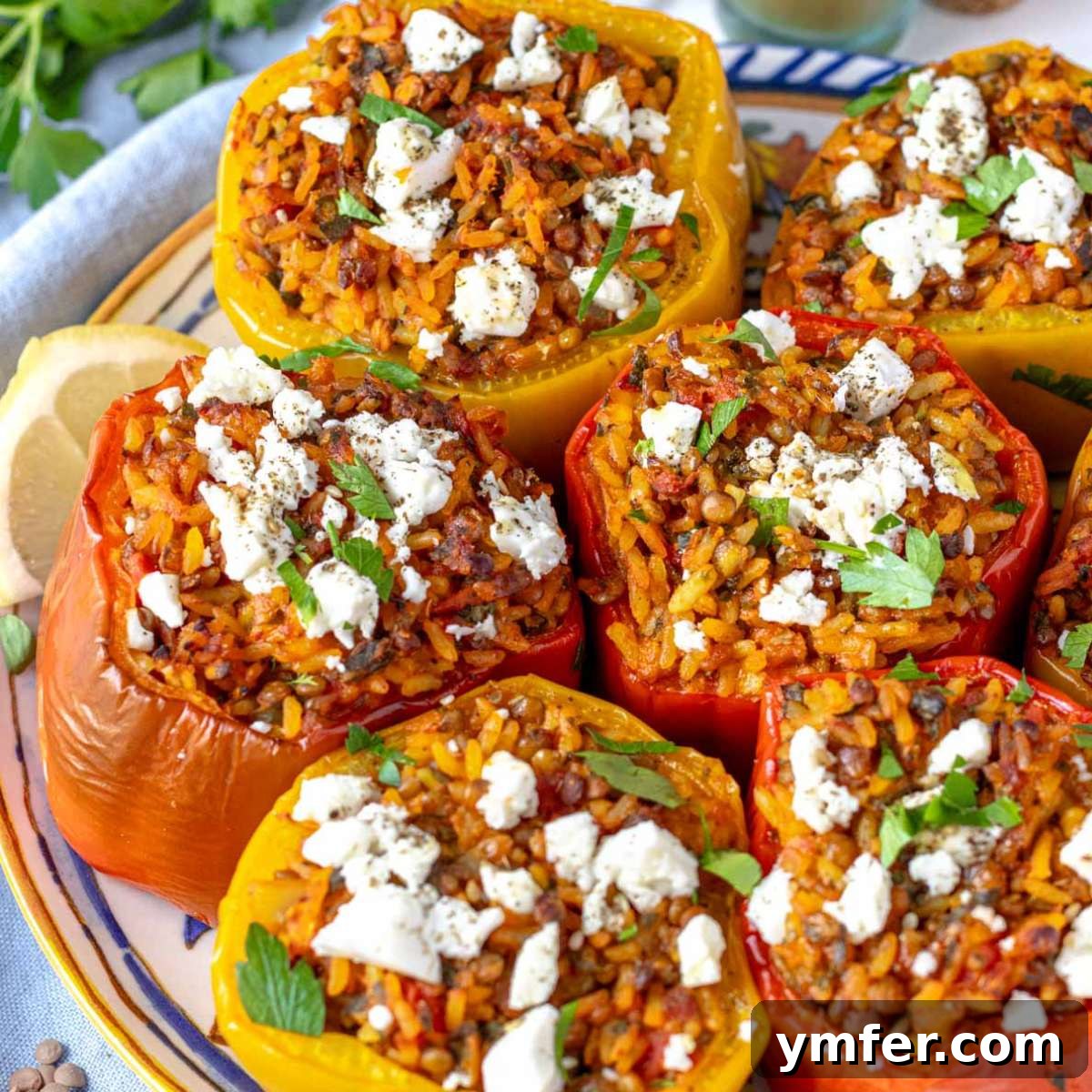 Mediterranean Diet for Vibrant Health 10 Oven-baked Mediterranean stuffed bell peppers, bursting with a savory and aromatic filling of rice, lentils, and fragrant herbs, presented as a wholesome and vibrant vegetarian main dish.
