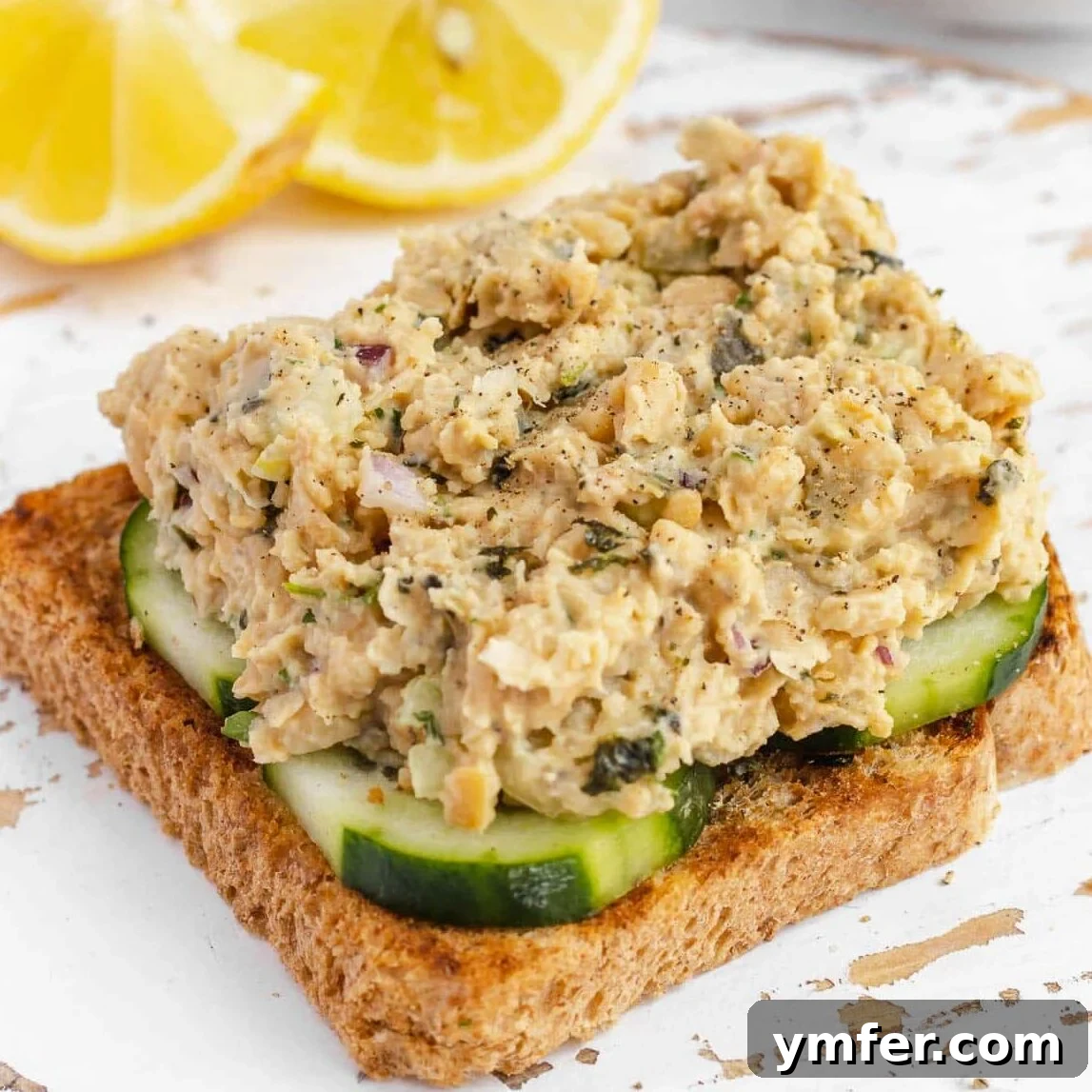 Strong & Satisfying: 21 High-Protein Salad Recipes 10 vegan tuna on a slice of bread and cucumbers