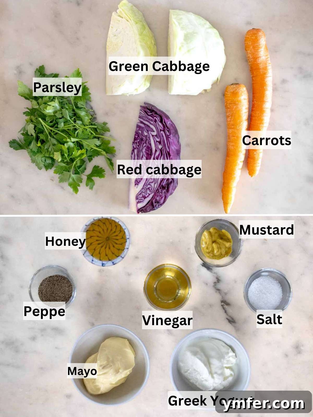 Wholesome & Creamy Greek Yogurt Coleslaw 4 Fresh ingredients laid out for Greek yogurt coleslaw, including vibrant green and red cabbage, crisp carrots, fresh parsley, and creamy dressing components.