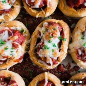 Cheesy Chicken Parm Meatball Sliders 6 These mini chicken Parmesan meatballs subs totally step up your game day food! Stuffed with homemade chicken Parmesan meatballs, tomato sauce and topped with lots of melty mozzarella cheese. Crazy delicious and ready in under an hour!