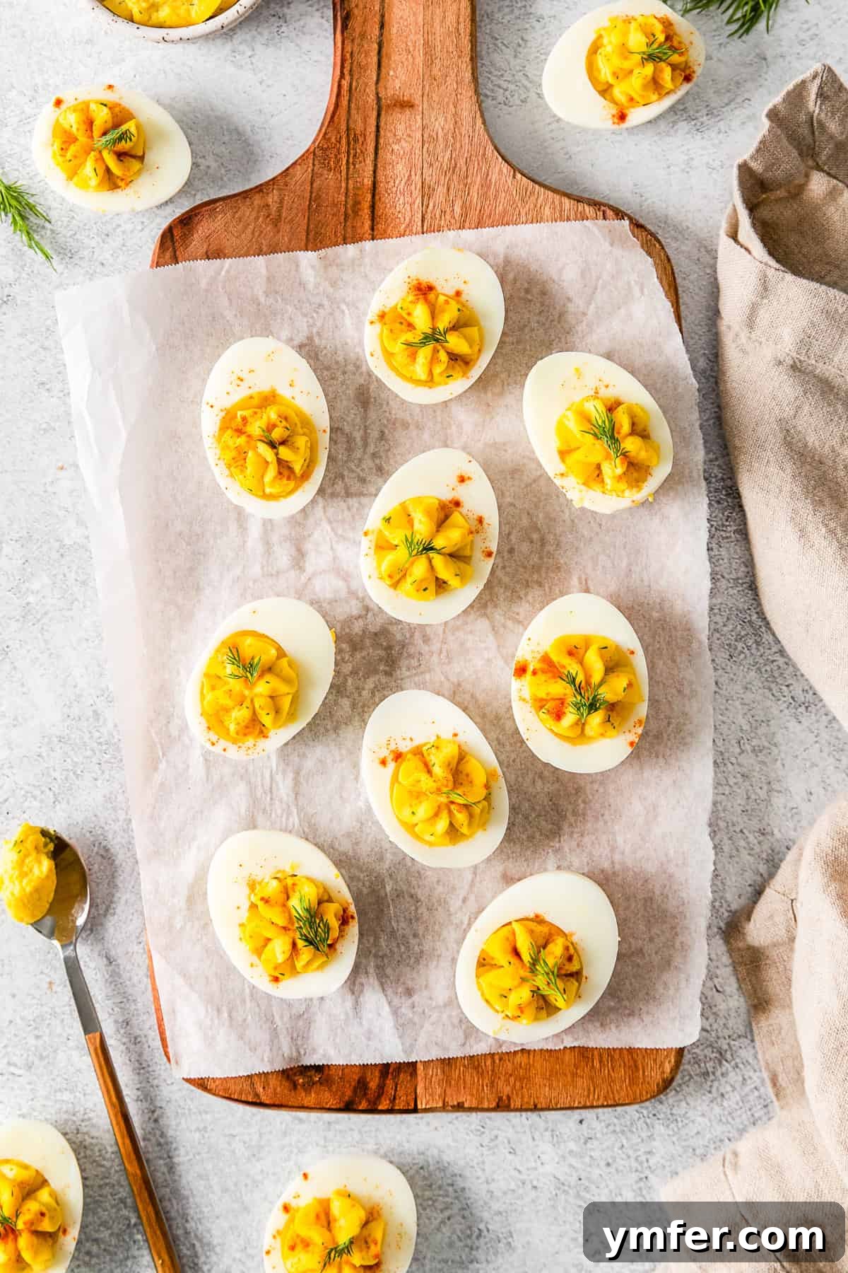 Heirloom Deviled Eggs 2 A vibrant platter of Classic Deviled Eggs, beautifully garnished and ready to serve.