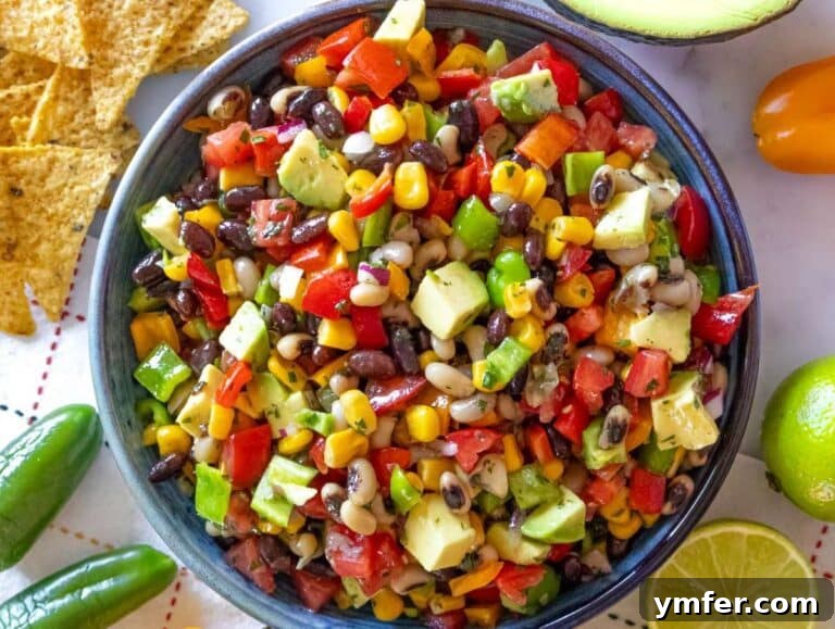 Step 4 Serving Cowboy Caviar dip with tortilla chips as a fresh colorful appetizer.