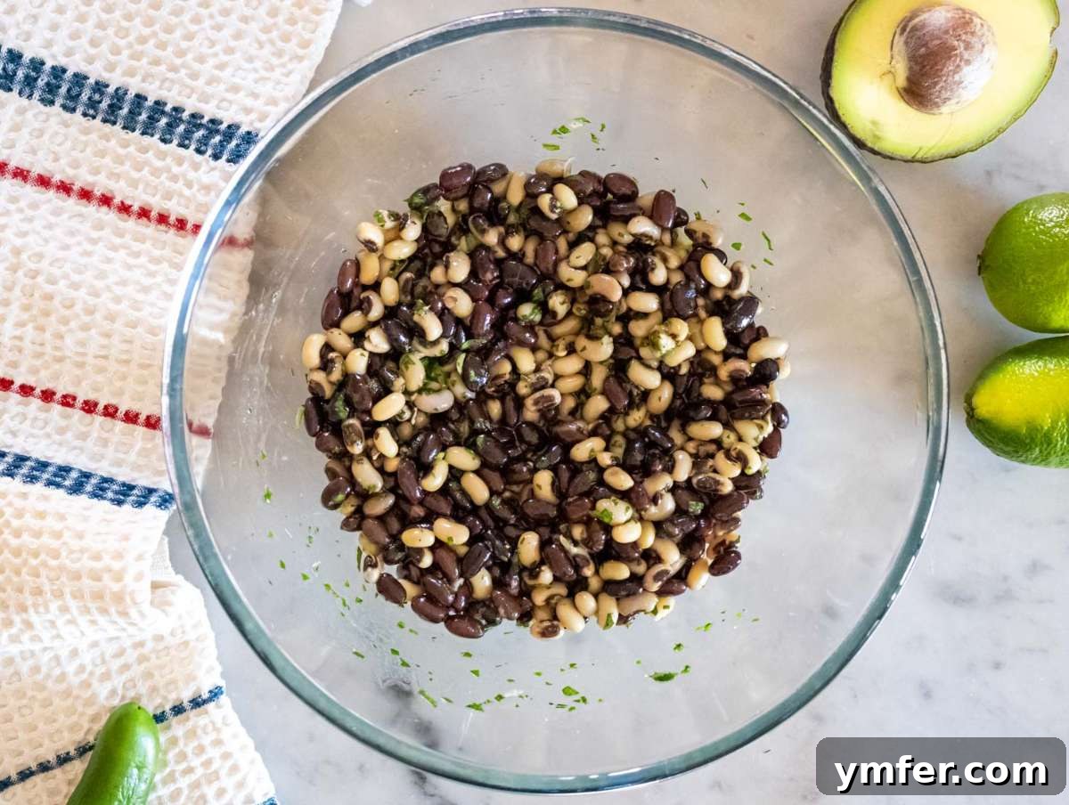 Southwestern Marinated Bean Medley 6 Step 2 Black beans and black eyed peas marinating in Cowboy Caviar dressing for flavor.