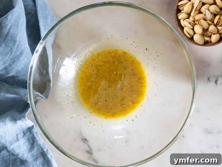 Step 2 Making the dressing in a bowl with olive oil vinegar honey and mustard.