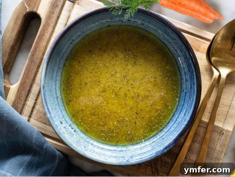 Mediterranean Kale Power Salad: Healthy and Fiber-Packed 11 Step 3 Whisking olive oil mustard honey vinegar and oregano in small bowl for the dressing.