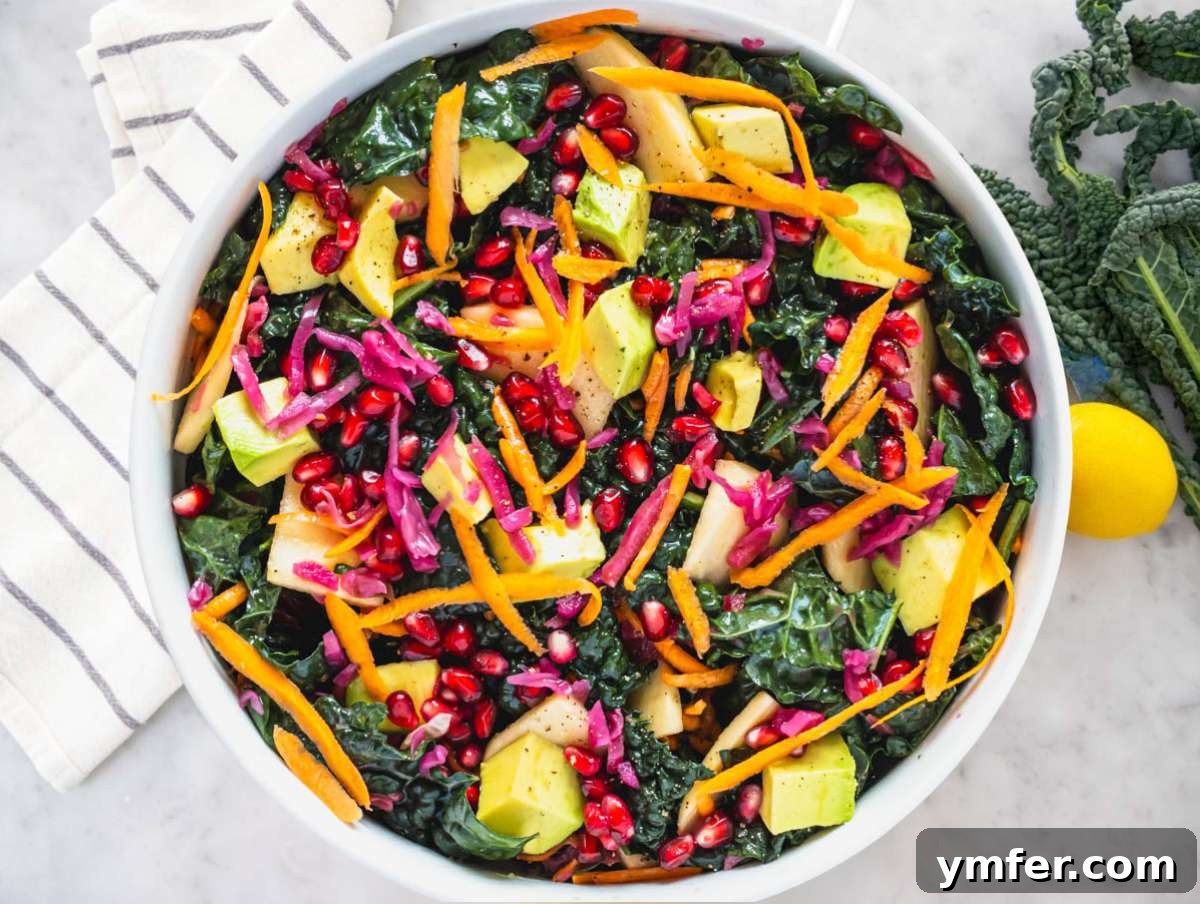 Mediterranean Kale Power Salad: Healthy and Fiber-Packed 5 Step 2 Adding apple carrot avocado cabbage and feta to massaged kale salad base.
