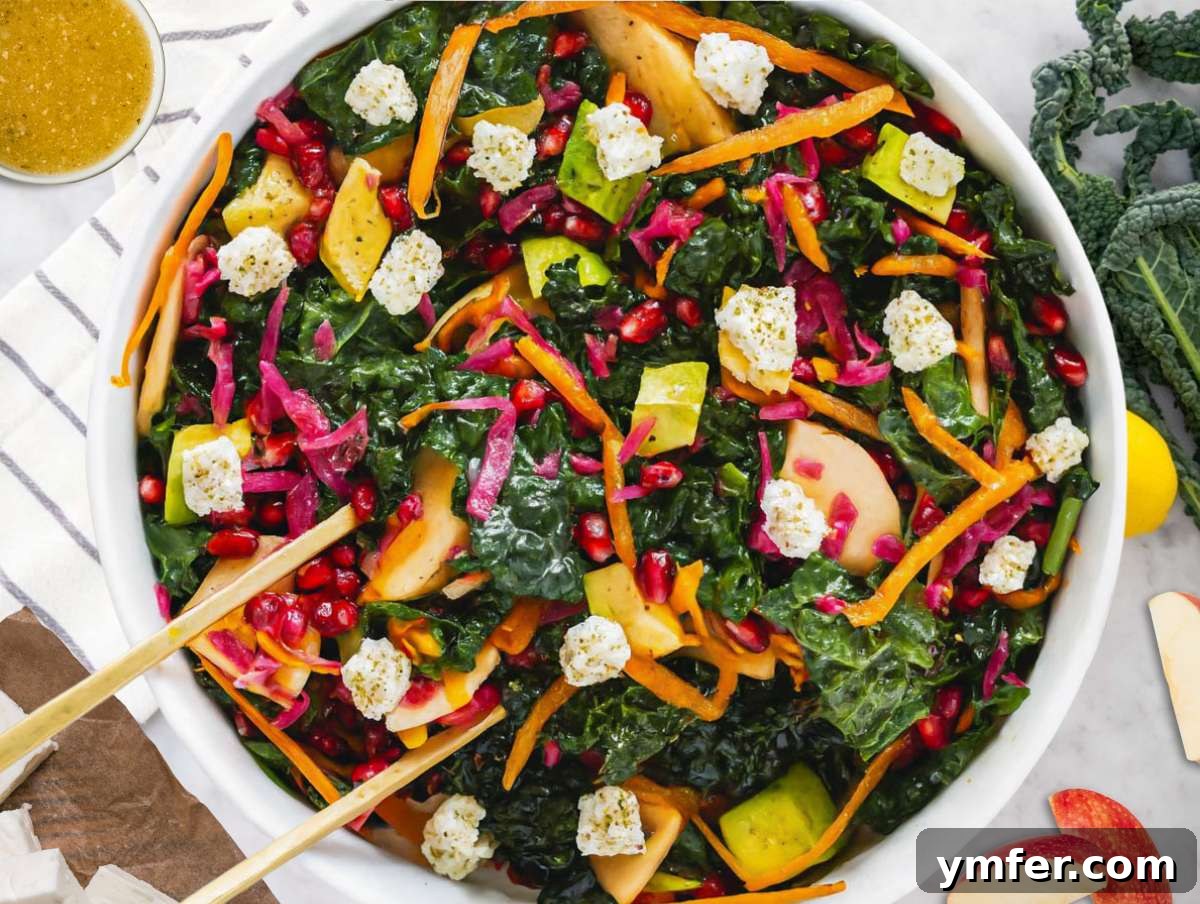 Mediterranean Kale Power Salad: Healthy and Fiber-Packed 7 Step 4 Tossing Mediterranean kale salad with feta apple avocado and homemade dressing before serving.