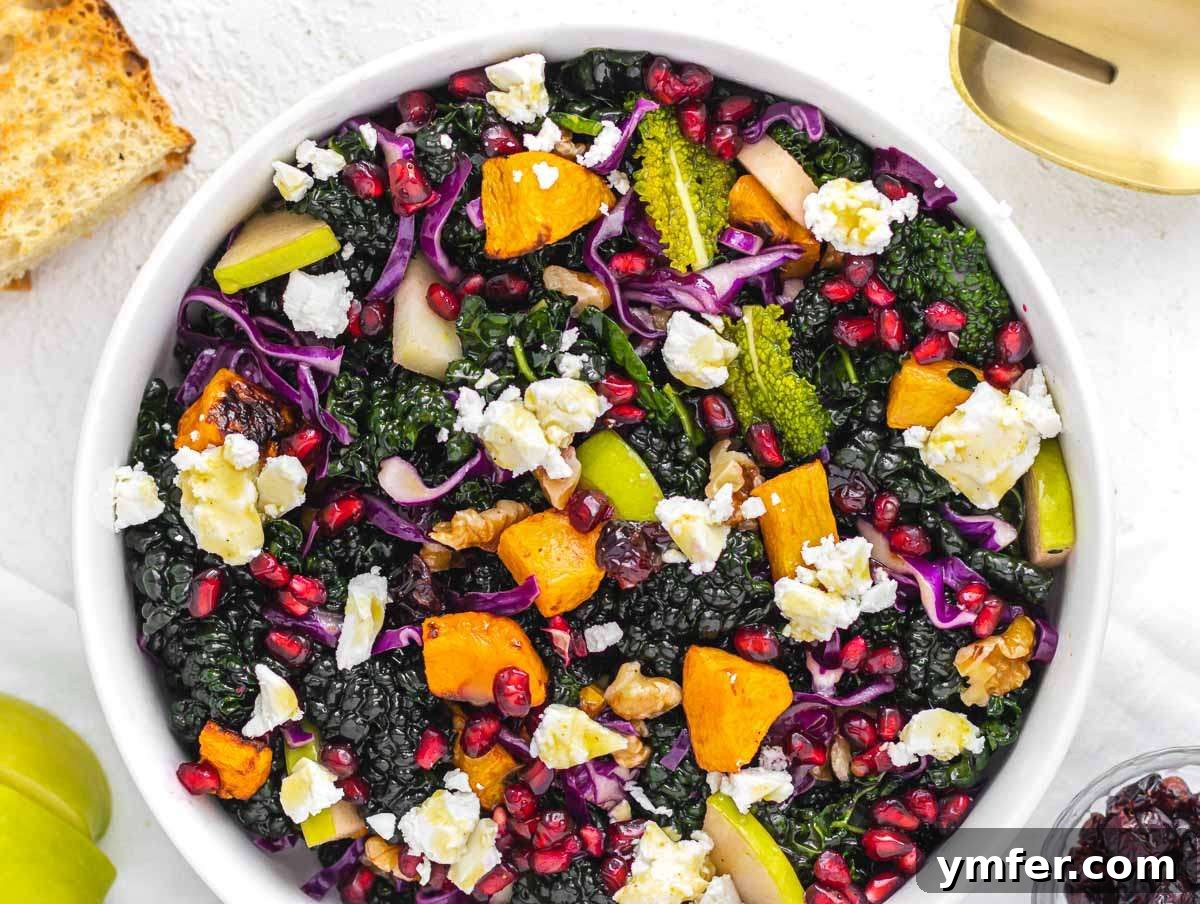 Nourishing Butternut Squash Kale Salad 8 Step 4 Colorful salad bowl with kale roasted squash apple walnuts feta and pomegranate tossed with dressing.