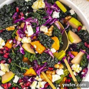 Nourishing Butternut Squash Kale Salad 9 Vibrant butternut squash kale salad with apple walnuts feta and pomegranate seeds.