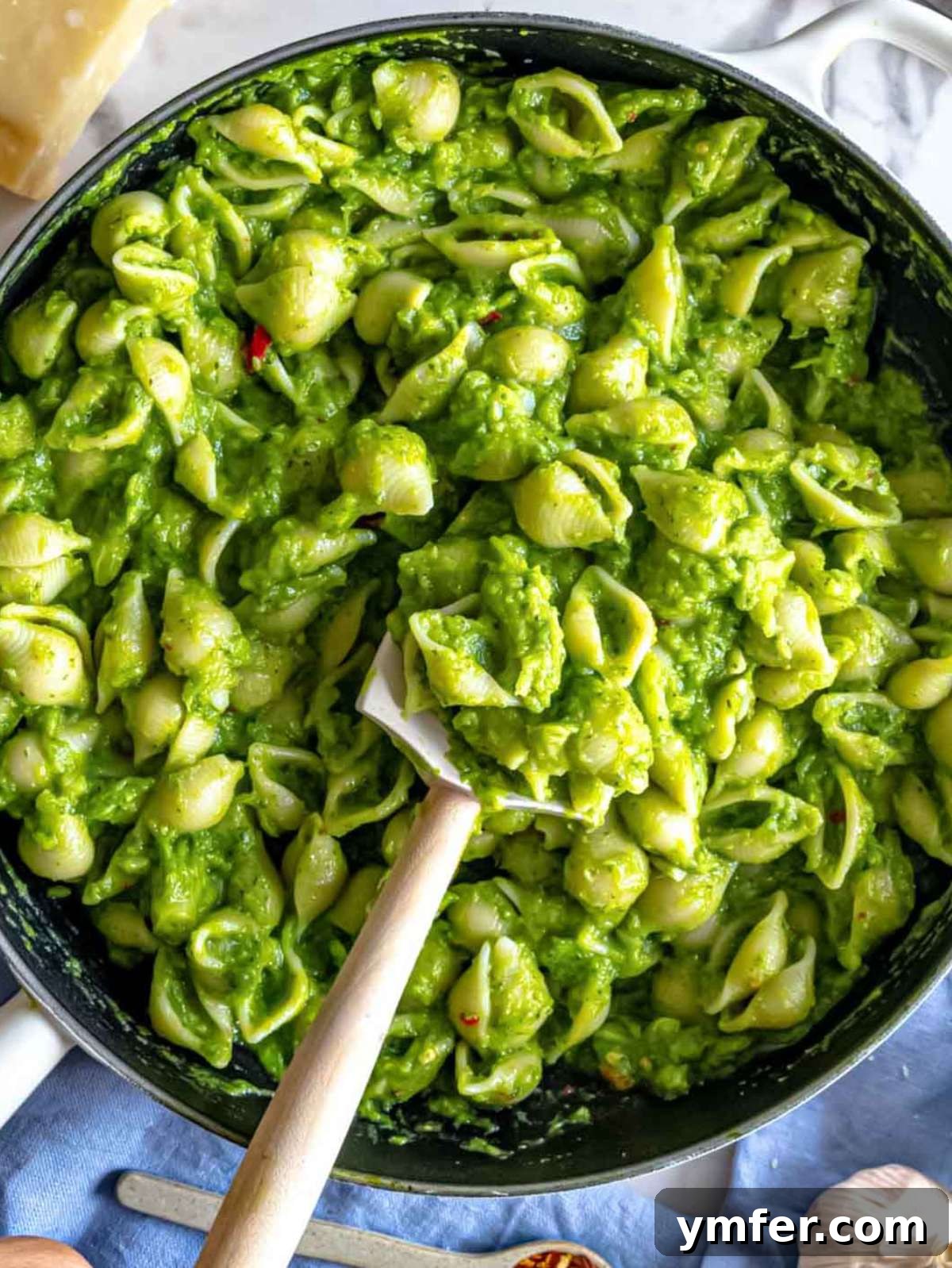 Top down view of smashed broccoli pasta served right from the skillet.