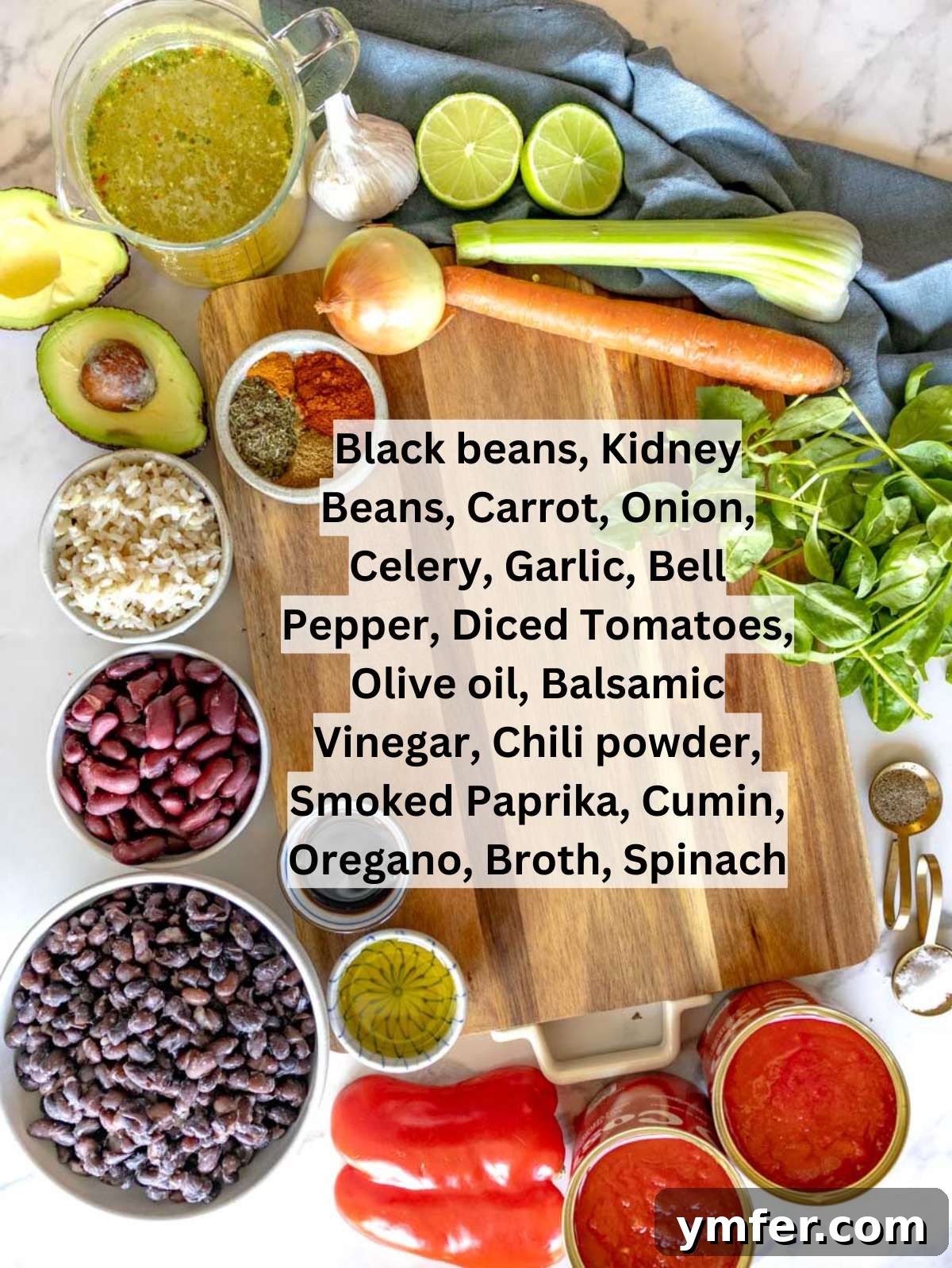 Protein Powerhouse Chili With Beans 3 Fresh ingredients for chili with beans including beans tomatoes vegetables and spices arranged on a table.