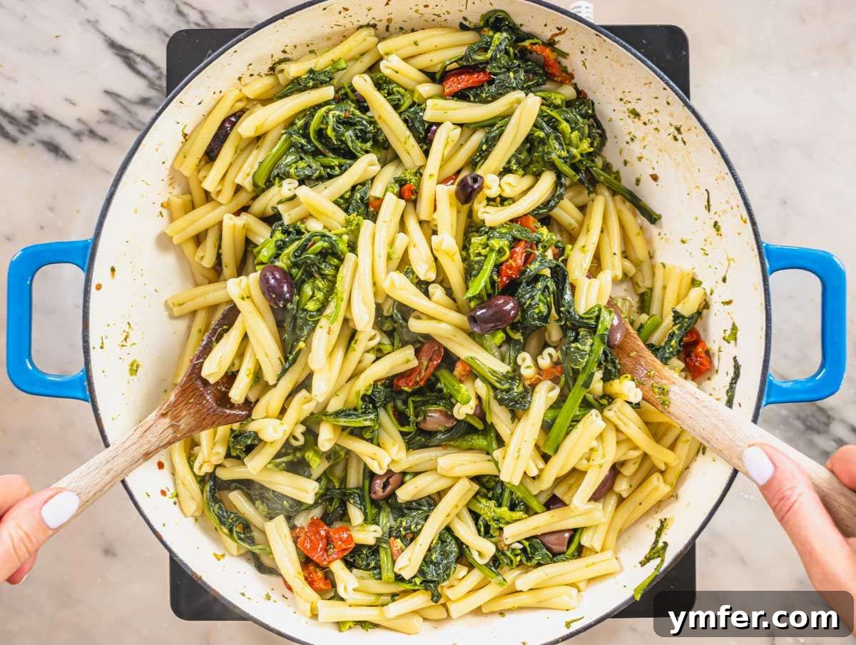 Coastal Greek Pasta Dinner 6 Step 3 Cooked pasta tossed with broccoli rabe olives and sun-dried tomatoes.