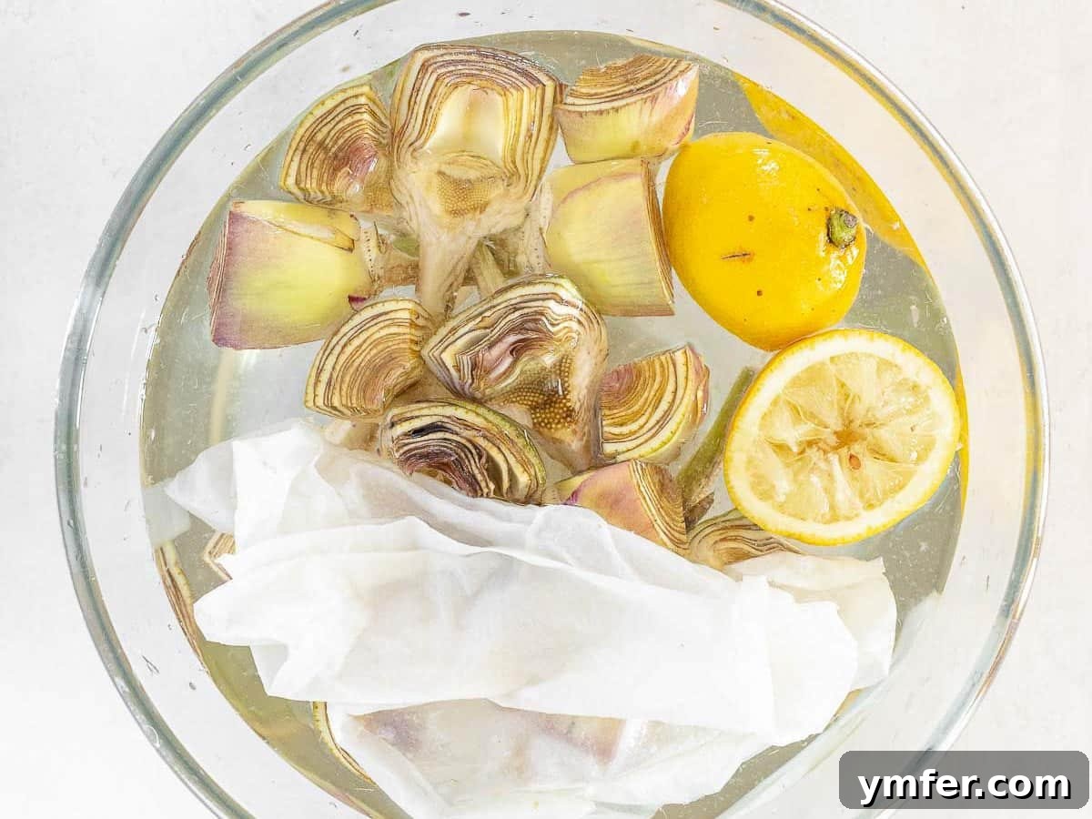 Simple Artichoke Recipes and Cooking Tips 19 artichokes in lemon water