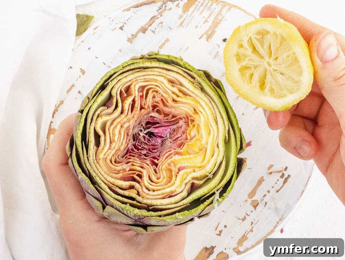 Simple Artichoke Recipes and Cooking Tips 5 rubbing artichoke with lemon