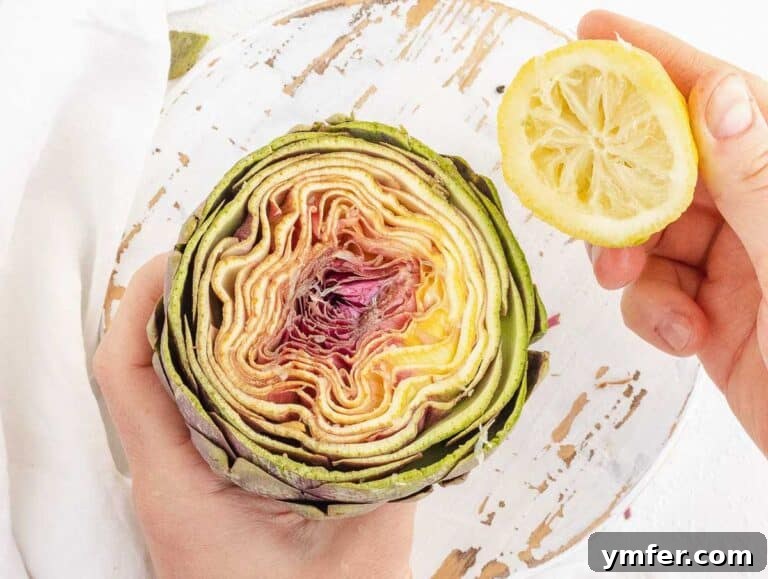 Simple Artichoke Recipes and Cooking Tips 37 rubbing artichoke with lemon