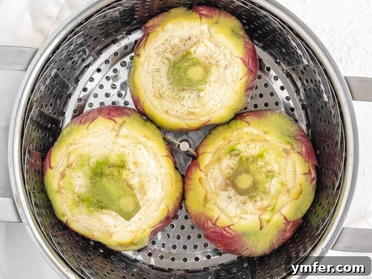 Simple Artichoke Recipes and Cooking Tips 43 artichokes in a steamer basket