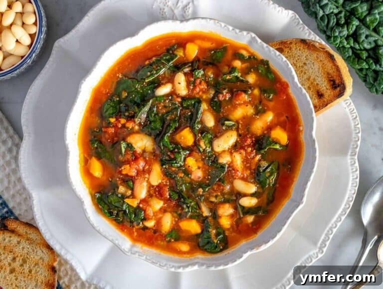 Heart-Smart Mediterranean Kale Soup 13 Step 4 Serving Mediterranean kale soup with a olive oil and slice of crusty bread.