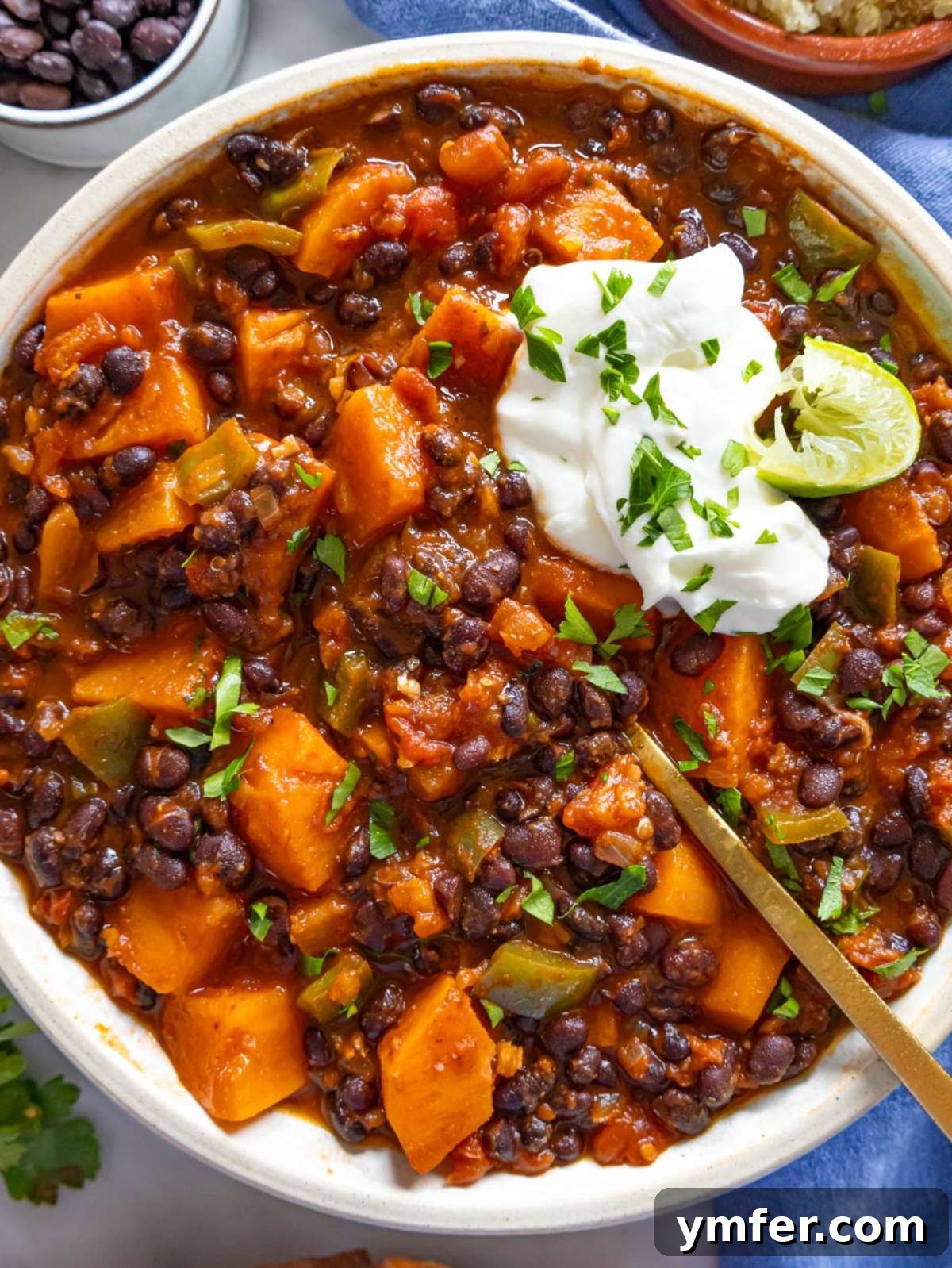 Quick, Healthy Black Bean Chili 2 Healthy black bean chili served in a bowl with lime rice and Greek yogurt.