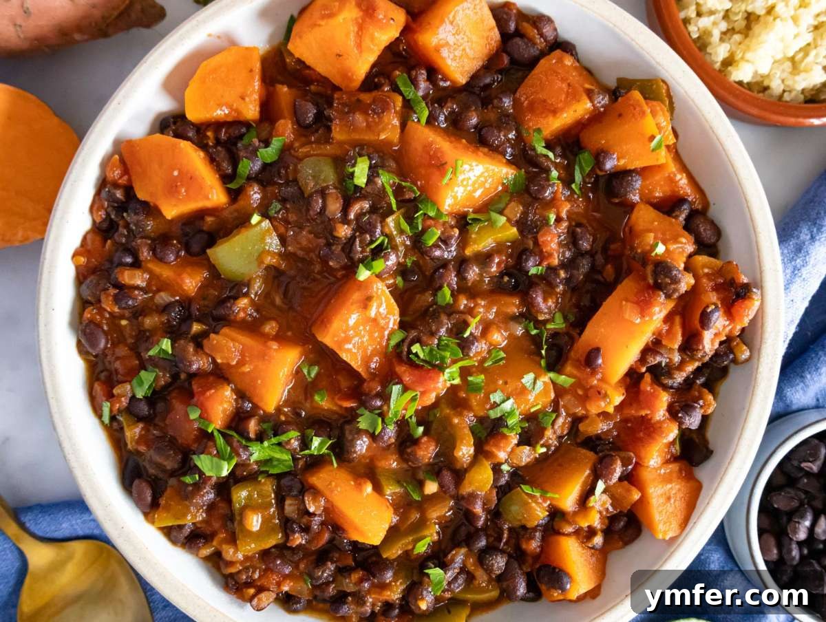 Quick, Healthy Black Bean Chili 8 Step 4 image – Serving this healthy black bean chili in a hand-made rustic bowl.
