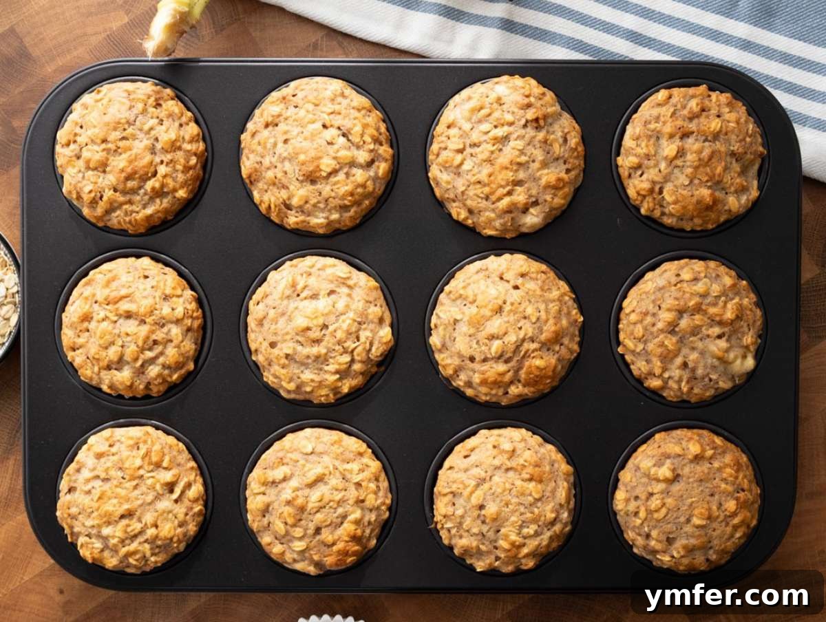 Wholesome Oil-Free Banana Oat Muffins 8 Step 4 Golden banana oatmeal muffins just baked still in the muffin pan.