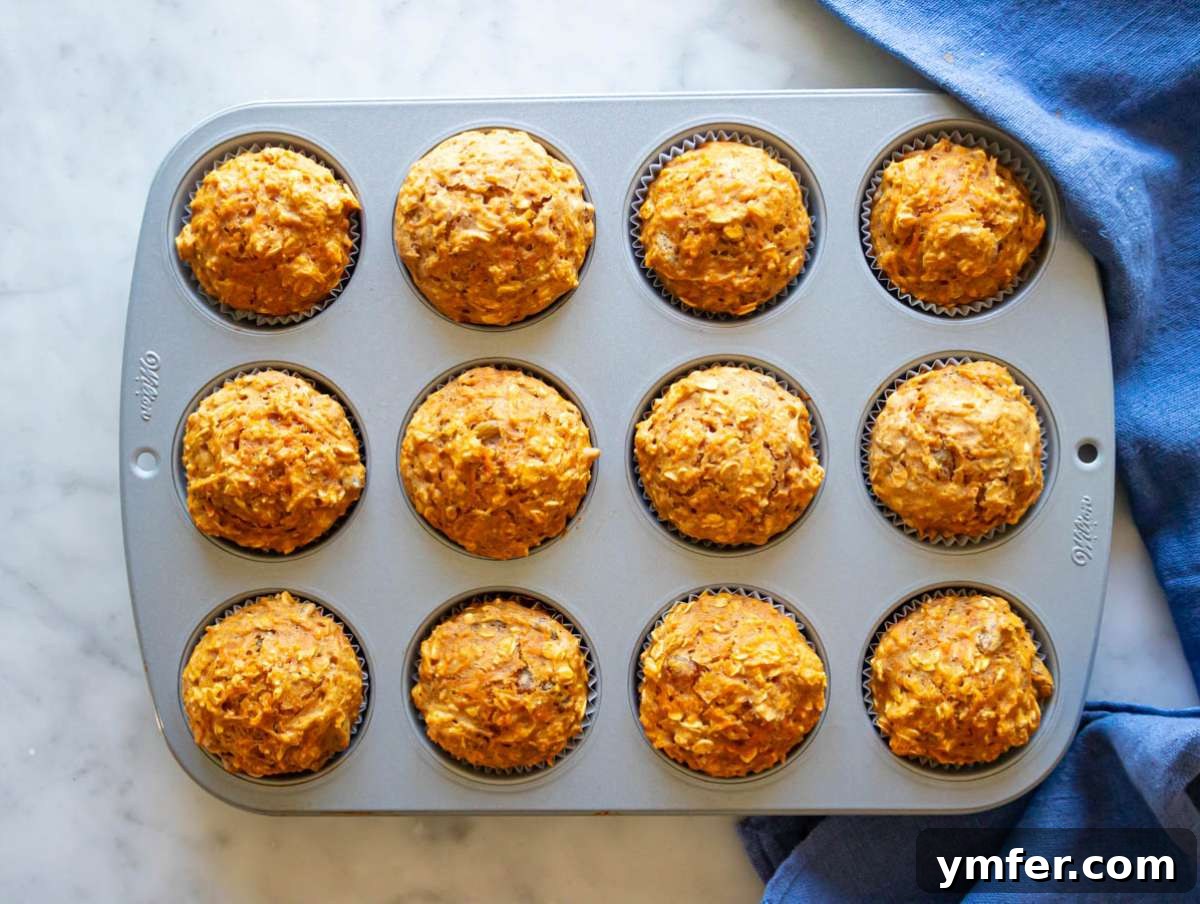 Smart Start Carrot Muffins 9 Step 5 baked muffins cooling in muffin pan after coming out of oven.