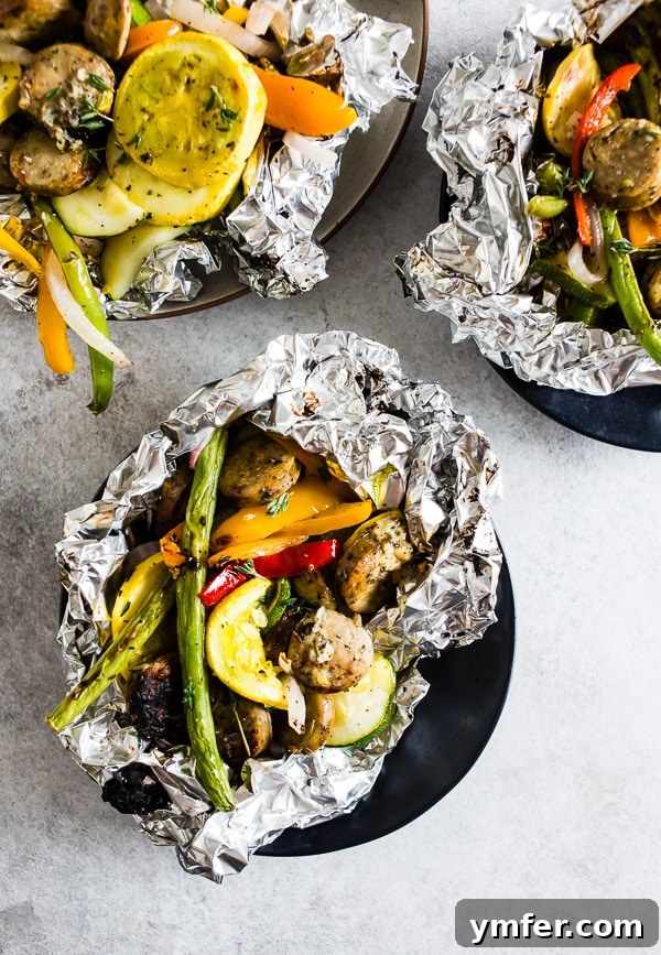 Hearty Chicken Sausage and Roasted Veggie Foil Bundles 2 Flavorful chicken sausage and colorful vegetables cooked in a foil packet, a perfect healthy summer dinner.