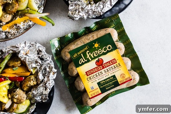 Hearty Chicken Sausage and Roasted Veggie Foil Bundles 6 The delicious contents of a foil packet dinner, perfectly cooked and ready to serve.