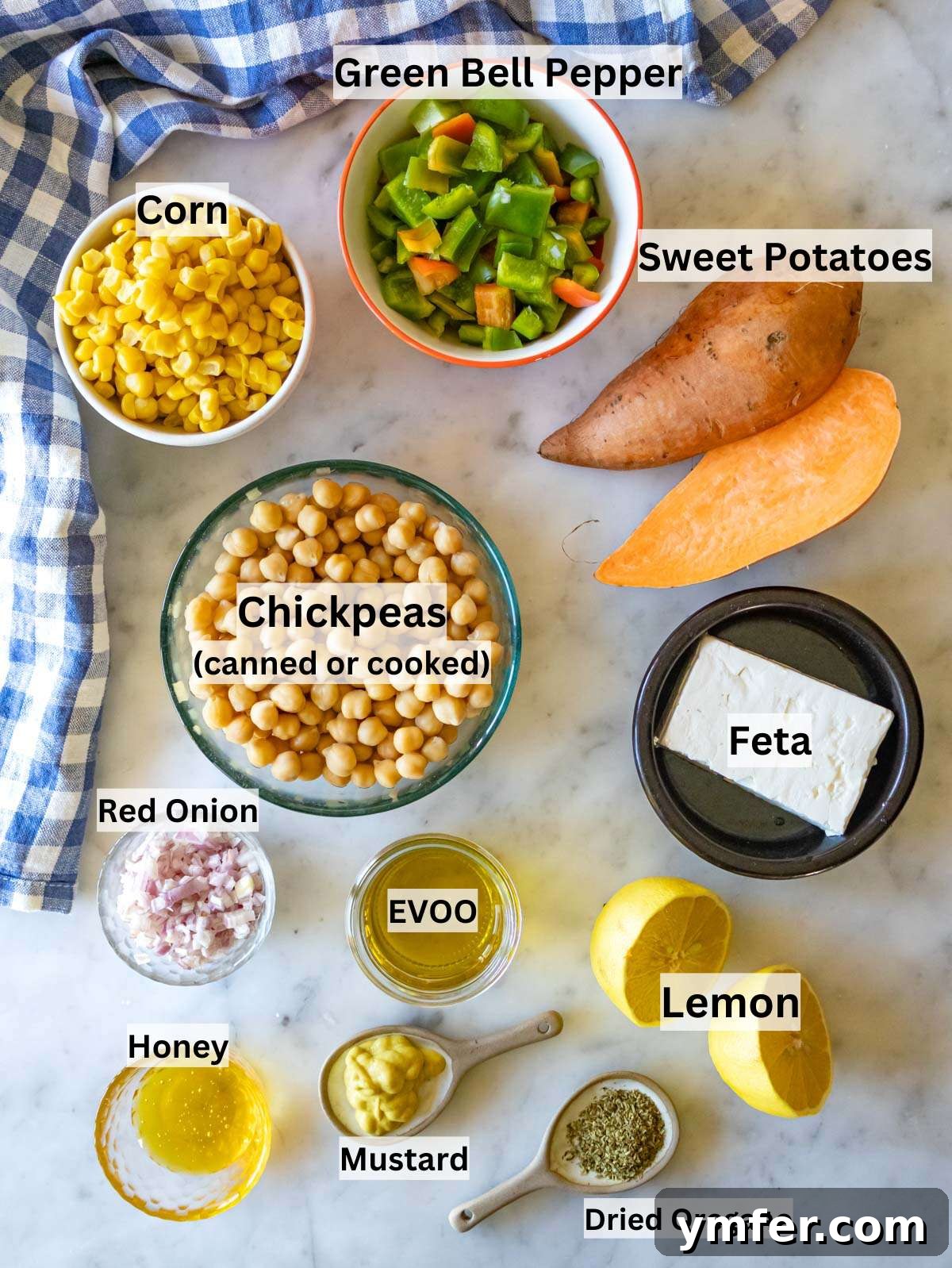 Nourishing Sweet Potato Chickpea Salad 3 Ingredients for chickpea sweet potato salad with bell pepper, corn, feta, onion, and a honey mustard dressing, laid out neatly.