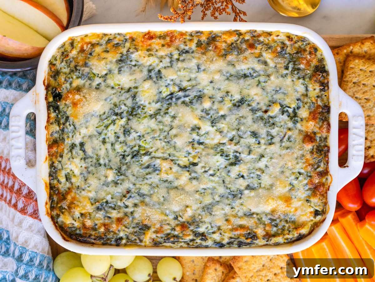 Step four baked spinach artichoke dip warm golden and ready to serve.