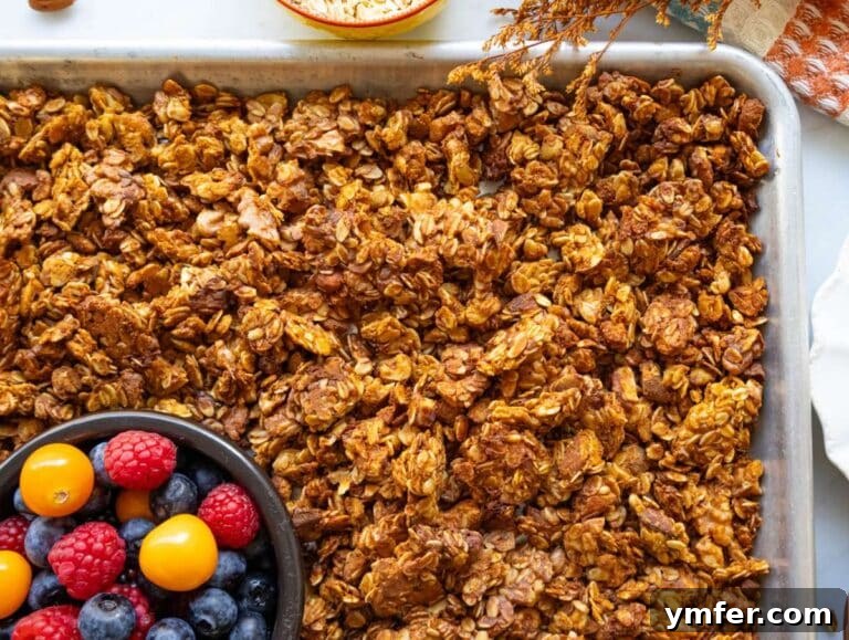 Step 4 Granola cooling on sheet pan to crisp up before storing for a healthy breakfast.