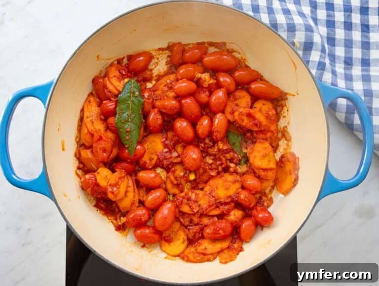 Mediterranean Orzo with Beans A Wholesome One-Pan Meal 12 Step 2 cooking garlic herbs and tomato paste to deepen Mediterranean flavors.