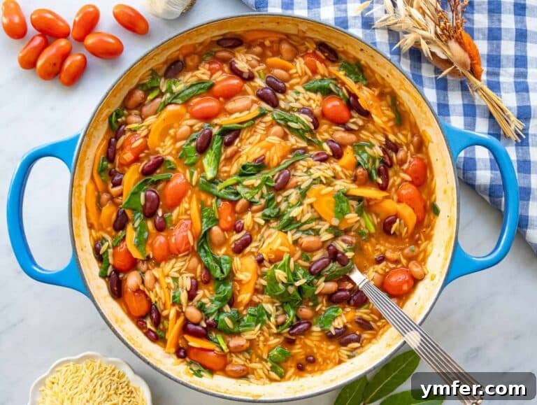 Mediterranean Orzo with Beans A Wholesome One-Pan Meal 15 Step 5 wilting spinach into orzo and beans for easy nutritious finish.