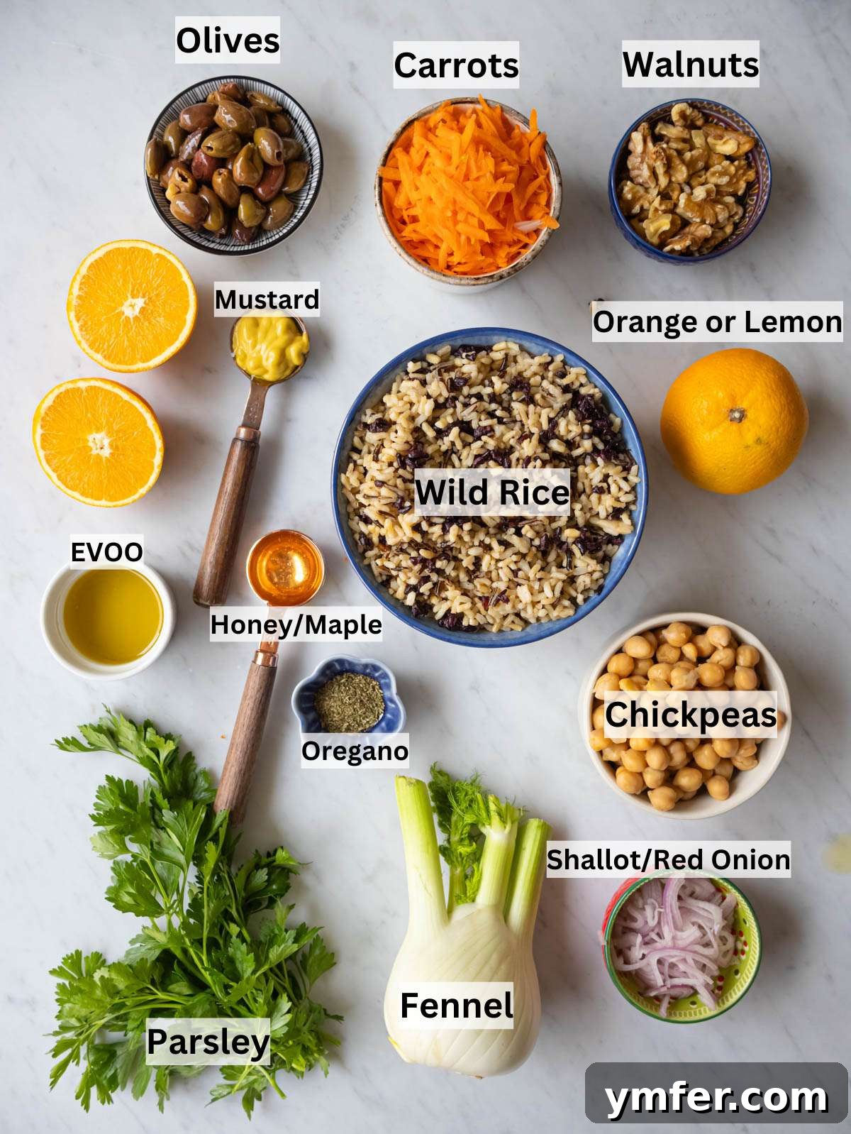 Mediterranean Wild Rice Salad for Healthy Meal Prep 3 Ingredients picture fresh vegetables chickpeas wild rice and citrus arranged for Mediterranean rice salad.