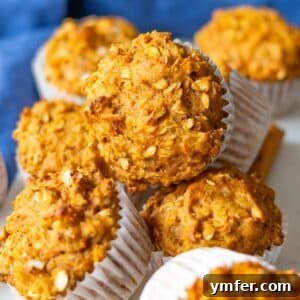 Wholesome Oil-Free Sweet Potato Oatmeal Muffins 10 Healthy sweet potato oatmeal muffins stacked for an easy oil free breakfast.