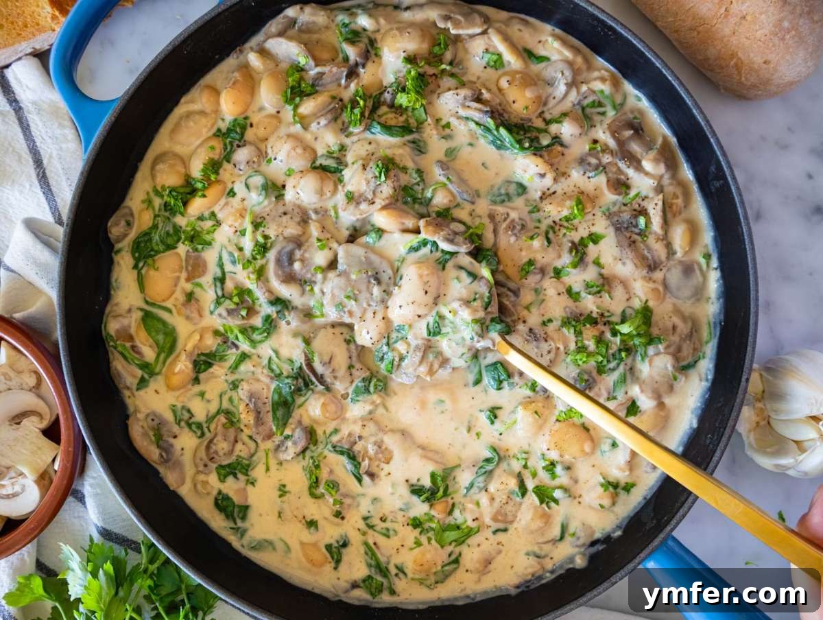 Fuel Up Fast: 25 High-Protein Bean Recipes in 30 Minutes 27 Step 5 Serving creamy Marsala butter beans garnished with parsley alongside crusty bread for dinner.