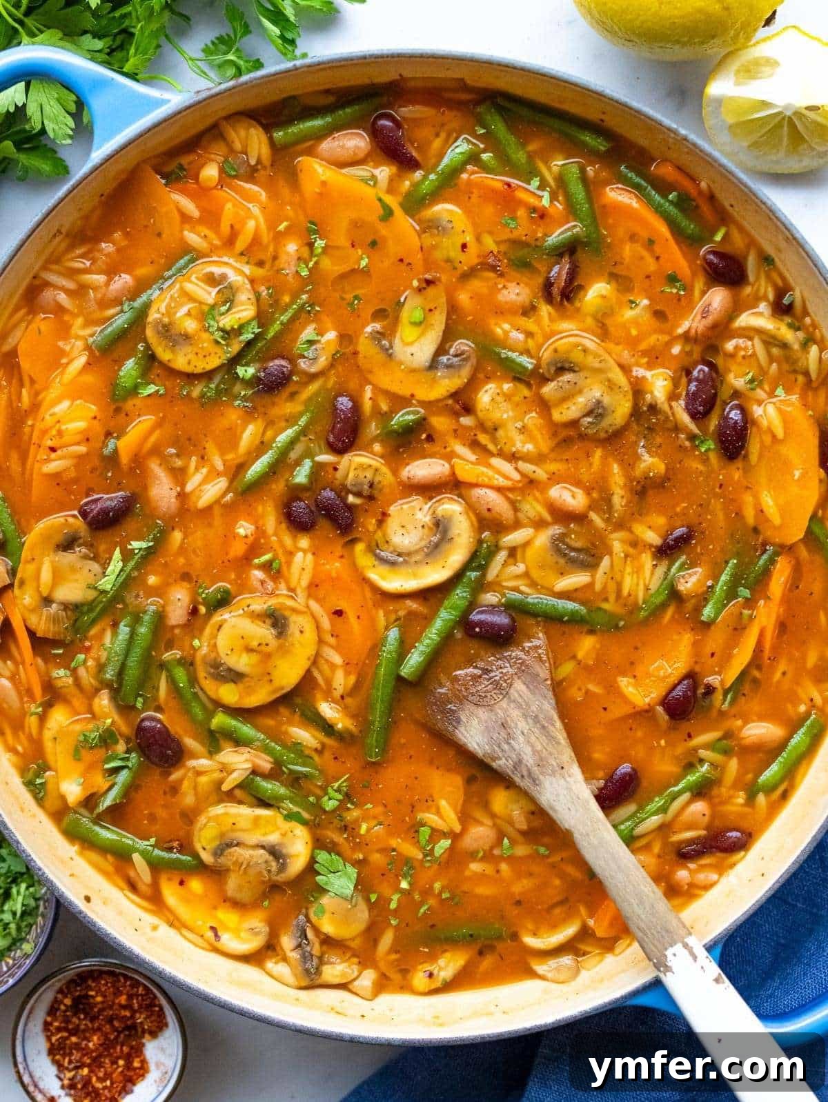 Healthy Mediterranean One-Pot Three Bean Orzo Soup 4 Finished soup top down hearty three bean orzo soup in a pot.