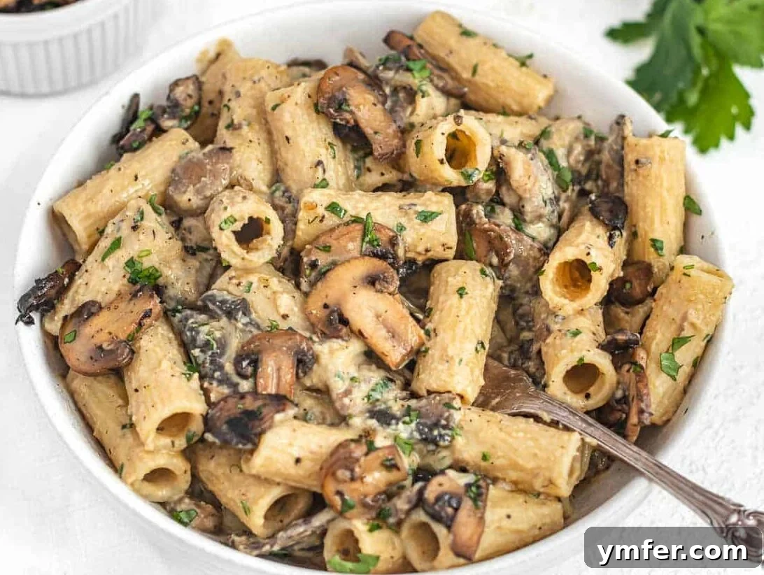 25 Affordable and Healthy Mediterranean Diet Meals 15 Hummus Pasta and fork