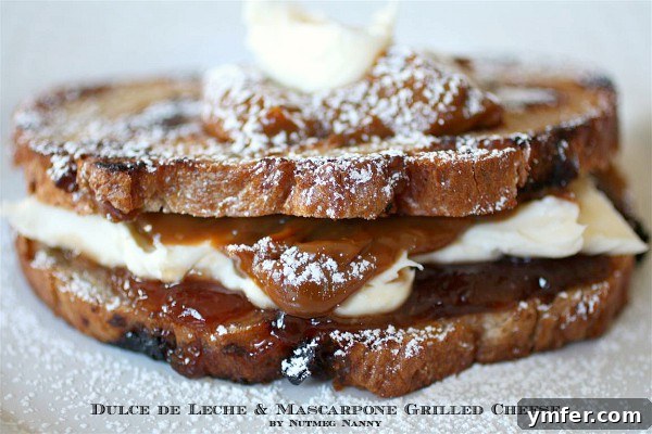 A sweet dessert grilled cheese layered with dulce de leche, mascarpone cheese and raspberry jam, grilled to perfection.