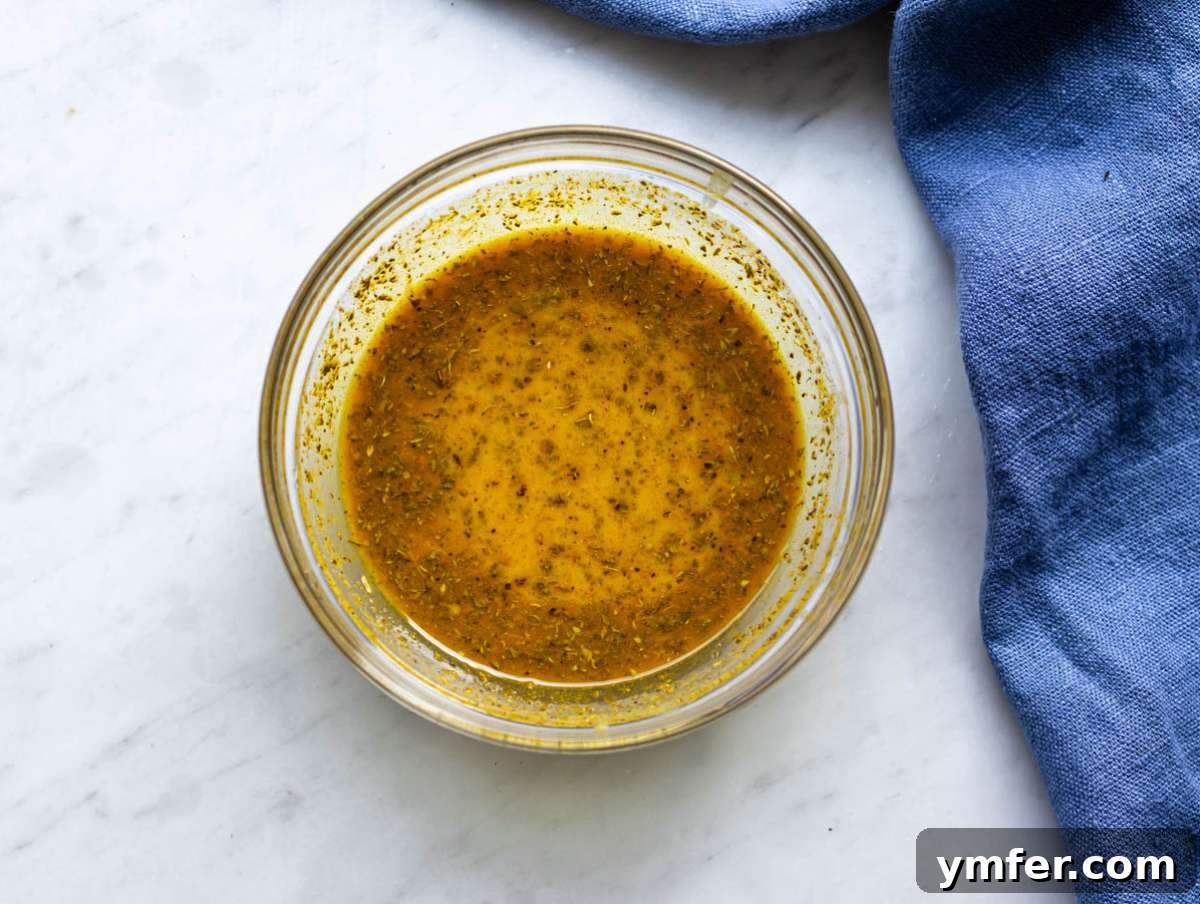 Golden Mediterranean Turmeric Vegetable Skillet 5 Step 1 golden stir fry sauce in a bowl ready for cooking.