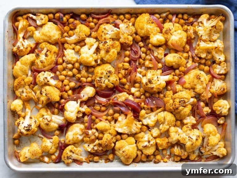 Step 2 Vegetables for cauliflower shawarma bowl roasted on sheet pan until golden tender and lightly charred.