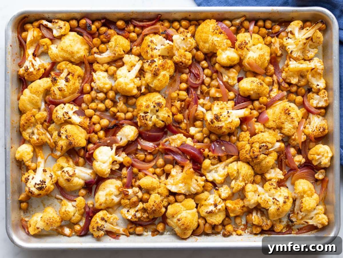 Step 2 Vegetables for cauliflower shawarma bowl roasted on sheet pan until golden tender and lightly charred.