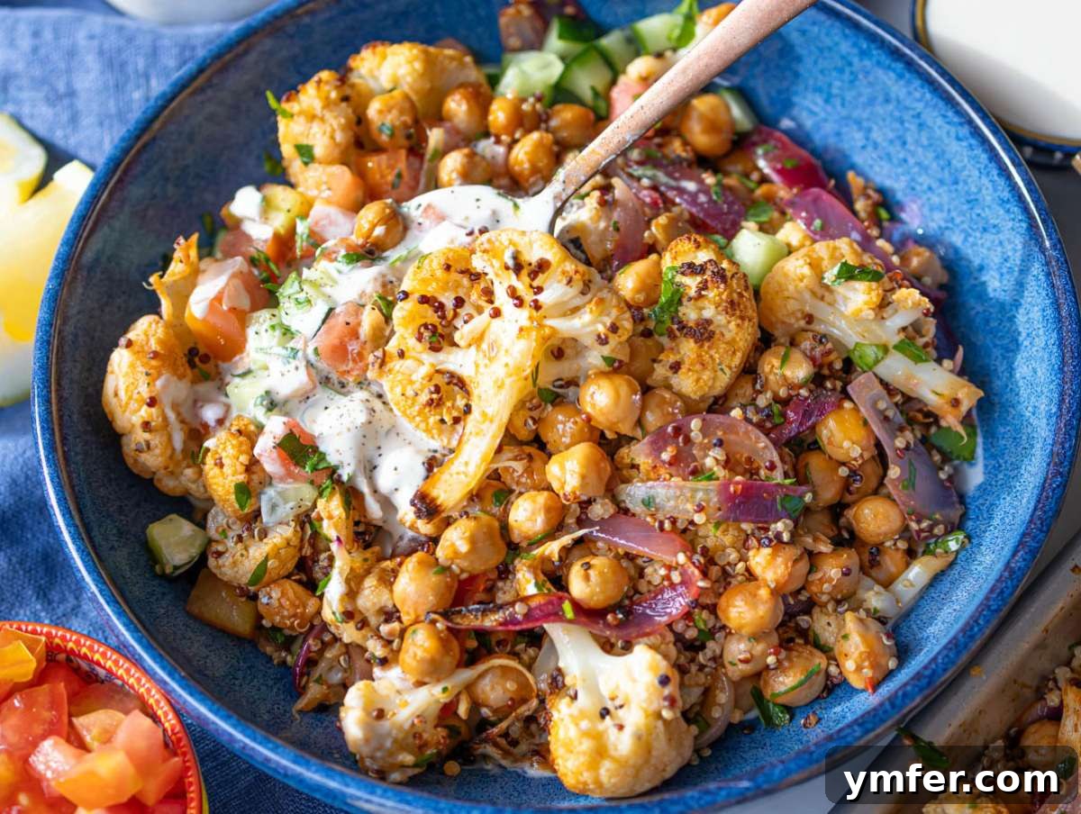 Step 4 Quinoa mixed with the roasted cauliflower and chickpeas and served in a bowl with a lemony yogurt sauce.