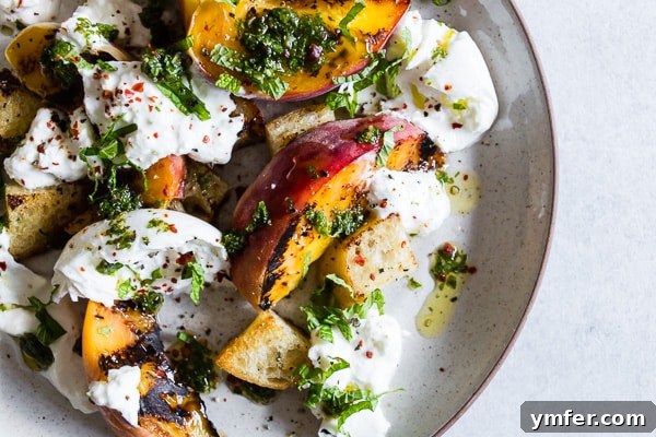 Sweet Smoky Peach Burrata Salad 5 A close-up shot of grilled peach burrata salad with vivid colors.