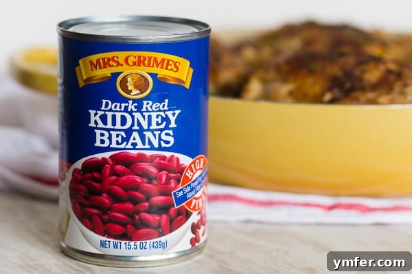 Smoky Cajun Chicken Rice Pot 4 A can of Mrs. Grimes red kidney beans on a rustic wooden table.