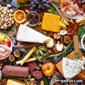 A beautifully arranged Fall Harvest Cheese Board.
