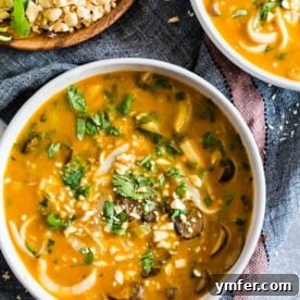 Warming Vegan Pumpkin Red Curry Noodle Soup 7 This vegan red curry pumpkin noodle soup is the perfect way to celebrate fall. Creamy pumpkin mixed with vegetable broth, coconut milk, mushrooms and baby bok choy all mixed together with Thai flavors and noodles for slurping.